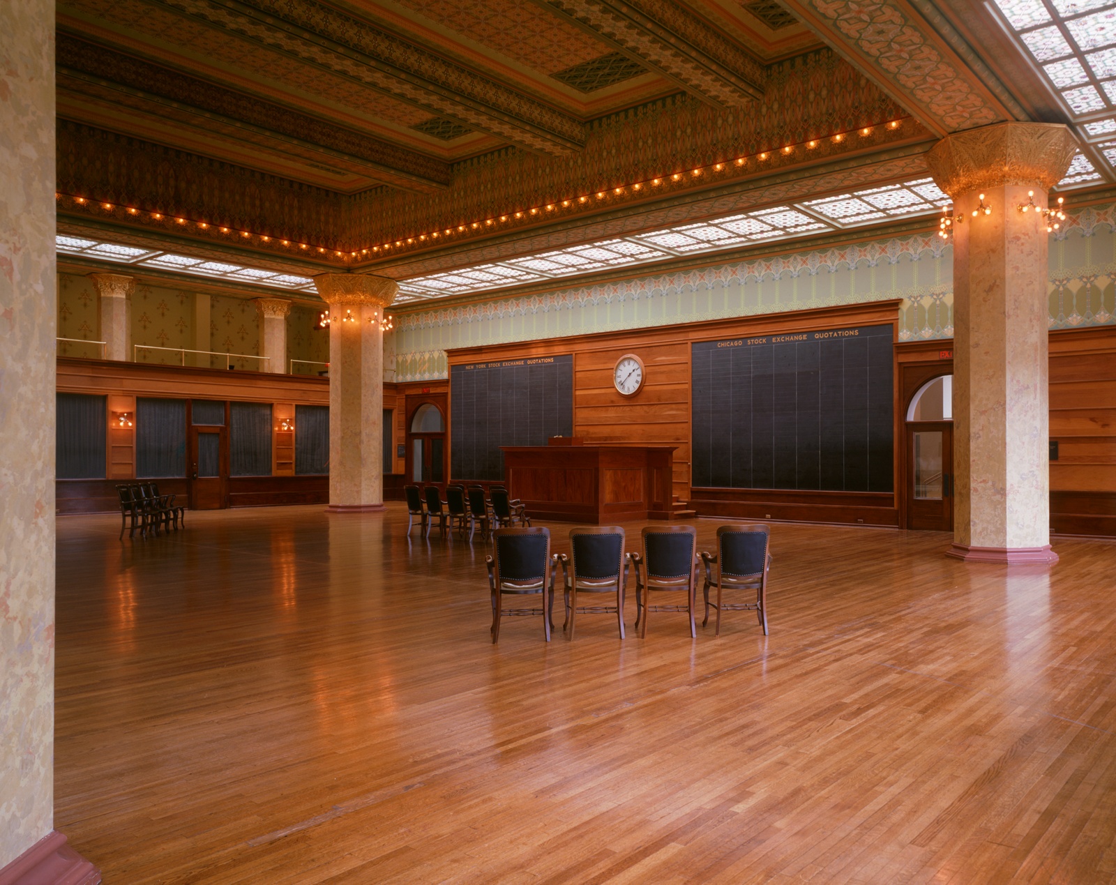 A reconstructed trading room with a balcony and columns