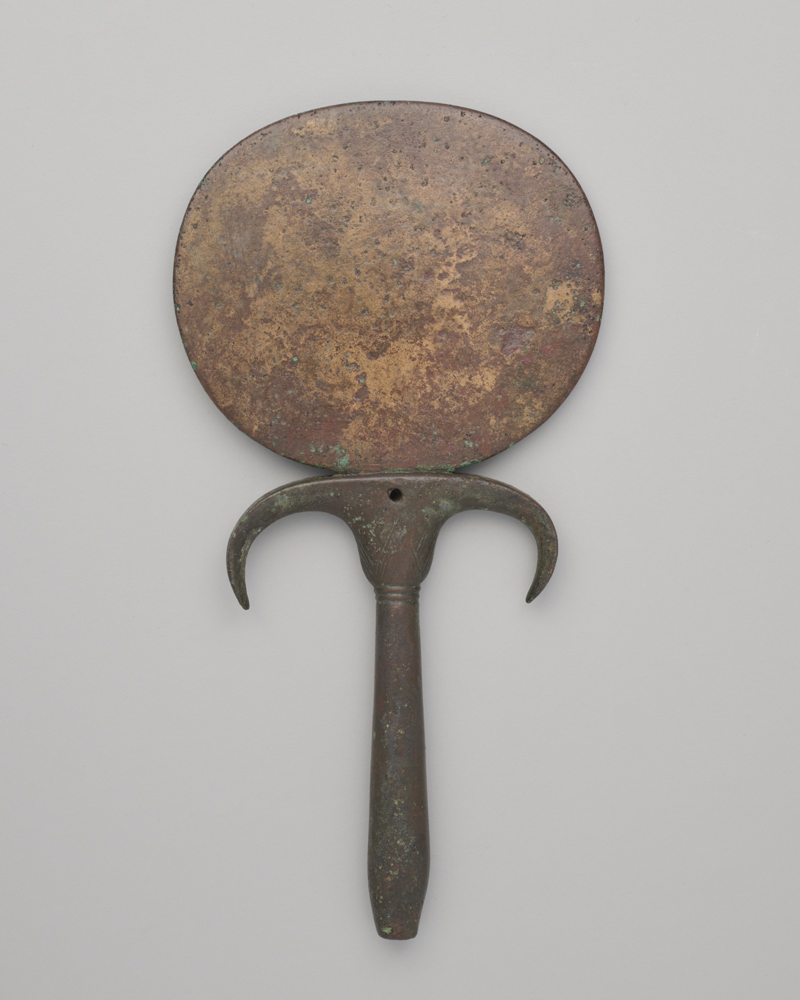 Ancient copper-alloy hand mirror