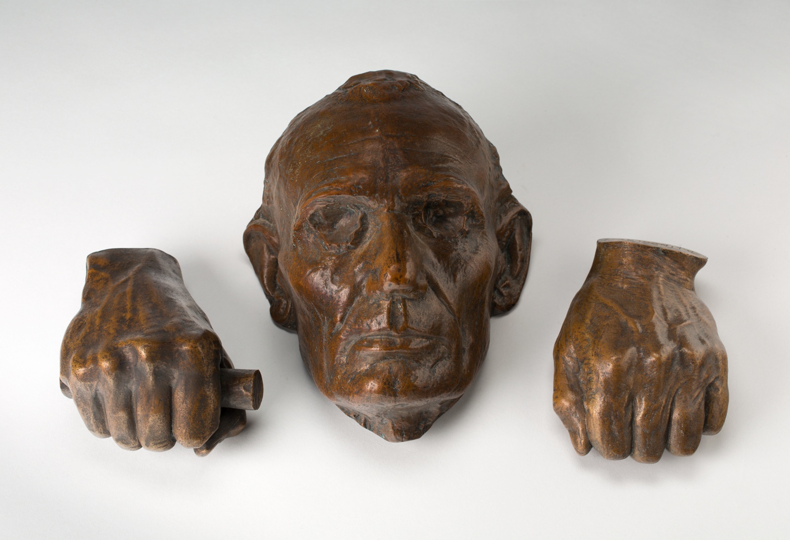 Bronze life cast of clenched hands